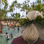 woman watches the Puuhonua o Honaunau hukilau