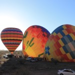 Balloons inflating in the desert