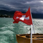 lake boat with Swiss flag