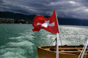 lake boat with Swiss flag