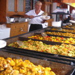 woman serves up street food in Budapest